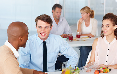 Image showing Business, staff and team on lunch, conversation and relax with happiness, collaboration and partnership. Group, men and women on a break, discussion and communication with food, planning and eating