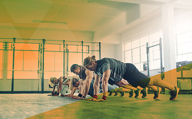 Image showing Fitness, gym and group push up exercise, workout and training in class. Sports men and women together in row for power challenge, energy or strong muscle at health and wellness club with overlay