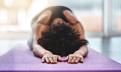 Image showing Yoga, fitness and wellness with a woman in studio on an exercise mat for inner peace or to relax. Health, exercise and zen with a female athlete or yogi in the childs pose for balance or awareness