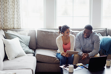 Image showing Happy couple, paperwork and on the sofa together or using laptop for bills or invoice and notebook for tax at home. Accounting, young family and on laptop or couch in the house or mortgage documents