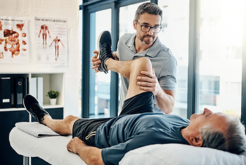 Image showing Stretching legs, rehabilitation and a physiotherapist with a man for wellness and disability support. Help, health and a male doctor helping an elderly person with physiotherapy on body muscle