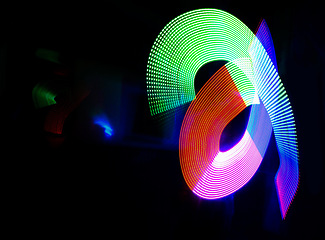 Image showing Abstract, art and light illustration against a black background for energy, glow or movement flow. Neon, creative and colorful pattern with mockup for speed, vibration or texture with color splash