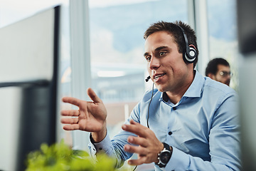 Image showing Businessman, call center and consulting on computer in customer service, support or telemarketing at office. Man employee, consultant or agent talking on PC for online advice or help in contact us