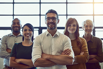 Image showing Confidence, crossed arms and portrait of a team in the office for unity, collaboration or teamwork. Happy, diversity and group of business people with success, support and leadership in the workplace