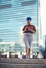 Image showing Black woman, phone text and city walking of a employee with happiness and social network app. African female person, mobile communication and networking with tech and internet by urban streets