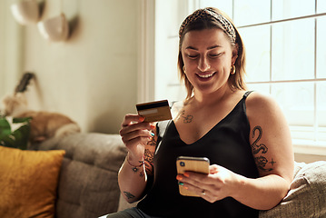 Image showing Phone, credit card and woman on sofa online shopping, e commerce and fintech payment, loan or happy finance. Person on couch typing banking information on mobile app for home transaction and finance