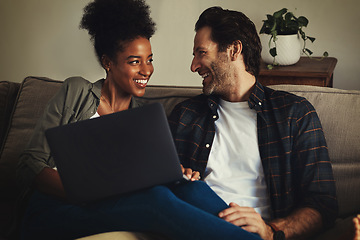 Image showing Laptop, entertainment and interracial with a couple streaming a movie using an online subscription service to relax. Computer, watching or internet with a man and woman bonding together over a film