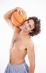 Image showing Sports, portrait and smile of man with basketball in studio isolated on a white background. Player, fitness and happy athlete with ball ready for training, exercise or workout for wellness and health