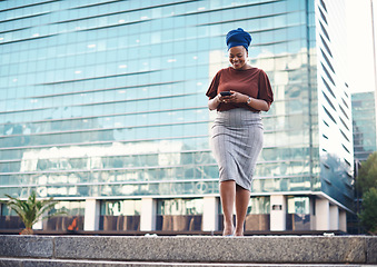 Image showing Black woman, phone and city travel walking of a employee with happiness and social network. African female person, mobile communication text and networking with tech and internet by urban streets