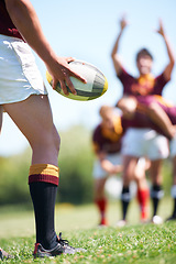 Image showing Rugby, closeup and man with a ball in hand outdoor on a pitch for teamwork, target and score. Male athlete team playing in sports competition, game or training match for fitness, workout or exercise