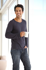 Image showing Morning, coffee and a man with a smile while thinking about a plan, idea or peace in a house. Happy, window and a person with a tea drink at home for happiness, break and relaxing in an apartment
