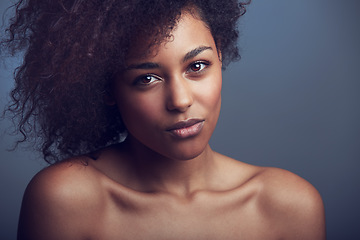 Image showing African woman, curly hair and studio portrait with makeup, cosmetics and health by dark background. Girl, model and wellness with skincare, natural aesthetic and glow on face with beauty by backdrop