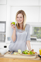 Image showing Kitchen, apple and portrait of woman with salad for healthy eating, meal and lunch at home. Food, nutrition and happy female person smile with fruit and vegetables for vegan diet, wellness and detox