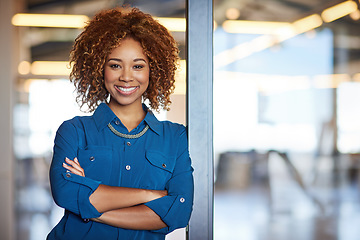 Image showing Corporate, portrait of young black woman with arms crossed and in a modern office at work. Success, entrepreneur and a confident happy African female worker standing at doorway at workplace.