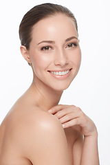 Image showing Portrait, smile and woman with beauty, dermatology and confident girl isolated against a white studio background. Face, female person and model with skincare, salon treatment and grooming with luxury