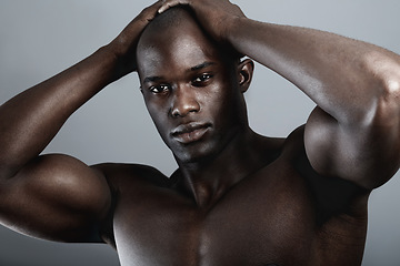 Image showing Art, aesthetic and beauty, portrait of black man on dark background with muscle and hands on head. Health, wellness and sexy African bodybuilder or male model isolated on studio backdrop with power.