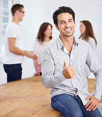 Image showing Man, thumbs up and portrait for success in office meeting teamwork, achievement and yes, ok or like sign for startup. Face of happy person and okay, thank you or agreement emoji or hand in management