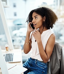 Image showing Phone call, talking and young woman in office for feedback, news or online discussion at startup business. Happy african person thinking and listening on cellphone, mobile or voip for client ideas