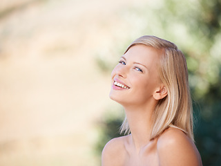 Image showing Portrait, woman and natural beauty or skincare, wellness and dermatology treatment on outdoor blurred background. Girl, happy and spa, facial care or confidence, fresh skin glow and bokeh mockup