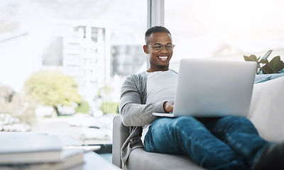 Image showing Man, laptop and working on home sofa or remote work, elearning or distance job and online study, freelance or email communication. African male, happy on computer and apartment or living room