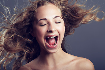 Image showing Beauty, eyes closed and hair care of woman shouting in studio isolated on a gray background. Natural, makeup cosmetics and skincare of female model with long hairstyle, growth and salon treatment.