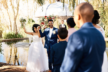 Image showing Wedding day, couple and walking cheer outdoor with yes and smile from marriage event. Celebration, happy African people and bride together with flower bouquet at love commitment ceremony winning