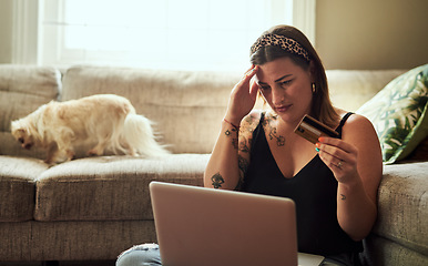 Image showing Laptop, credit card and woman headache, debt or confused for home loan, payment anxiety or fintech problem on floor. Stress, choice and decision of young person on computer, banking scam and mistake