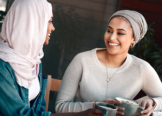 Image showing Friends, coffee shop and muslim with women in cafe for conversation, food and social. Happy, relax and culture with arabic female customer in restaurant for discussion, happiness and meeting