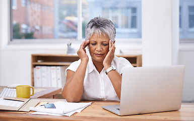 Image showing Stress, headache and woman on laptop in office administration for migraine, burnout or mistake. Brain fog, problem or migraine of senior business person massage temple and planning on her computer