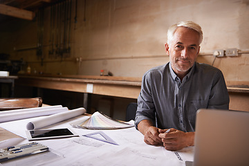 Image showing Man, senior architect in portrait with blueprint in workshop, professional designer and engineering. Architecture design, floor plan paperwork and technology with designing and creative male engineer