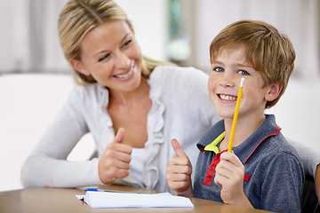 Image showing Portrait, child and teacher with thumbs up in classroom, smile and pencil. Happiness, educator and student with hand gesture for like emoji, agreement and learning in elementary school for education.