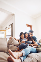 Image showing Love, smile and family on a couch, tablet and happiness at home, relax and connection for social media. Parents, happy mother and father on a sofa, technology and online reading with a female child