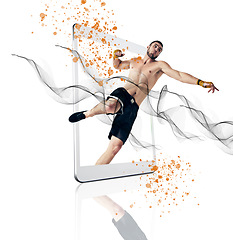 Image showing Fight, fitness and man on a tablet app for boxing isolated on a white background in a studio. Sports, website and a male boxer training for a competition with color splash on a mobile for cardio