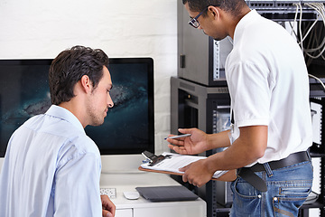 Image showing Server room, man or technician with clipboard writing receipt or talking to a client about cyber security glitch. Network, database or contract with a male engineer speaking of information technology