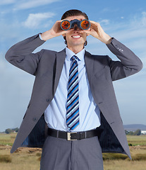 Image showing Binoculars, opportunity and search for business man outdoor with happiness, smile and investigation. Future, searching or happy businessman in nature with investigate gear, vision and ready for work