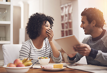 Image showing Love, breakfast and couple with a tablet, funny and happiness with joy, relax and bonding at home. Partners, man and happy woman in the kitchen, technology and loving with communication and laughing