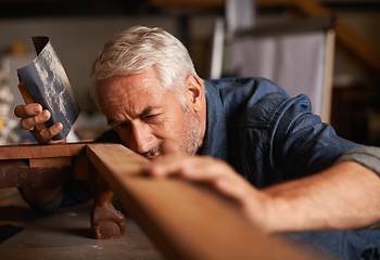 Image showing Carpenter, construction and senior man with wood project, thinking and checking with development. Mature male employee, entrepreneur or contractor with maintenance, renovation and handyman with tools