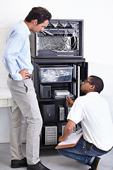 Image showing Server room, businessman or electrician with working on hardware maintenance after glitch in office. Network, clipboard or worker with a technician or electrical engineer for information technology
