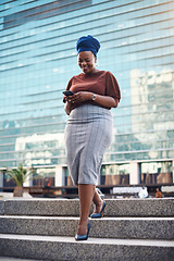 Image showing Black woman, phone and city walking of a happy employee with smile and social network app. African female person, mobile communication text and networking with tech and internet by urban streets