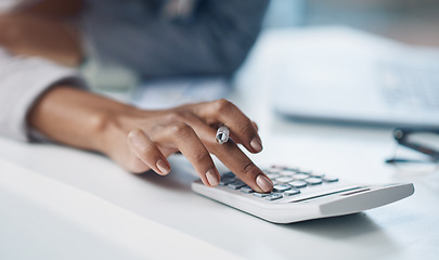 Image showing Calculator, accounting and woman hand working on finance investment report in office. Professional, taxes and closeup of female financial advisor doing calculation for asset management in workplace.