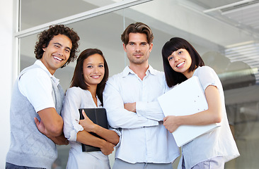 Image showing Business people, portrait smile and arms crossed in teamwork, leadership or management at the office. Happy employee professional standing in confidence for team building together at the workplace