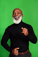 Image showing Happy, dance and portrait of black man on green screen for celebration, music or excited. Happiness, smile and energy with senior person dancing isolated on studio background for freedom and movement