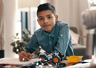 Image showing Learning, writing and portrait of kid with robotics homework, homeschool and science for tech project. Taking notes, car robot and boy child with knowledge, education and studying in house alone.