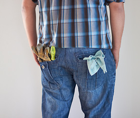 Image showing Handyman, contractor and back of builder jeans with tools, gloves and house work. Construction worker, carpenter person or building maintenance man ready for professional and home repair project