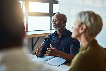 Image showing Business people, meeting and leadership of black man in office, talking or speaking. Teamwork, ceo and senior African male professional brainstorming, collaboration or planning strategy in workplace.