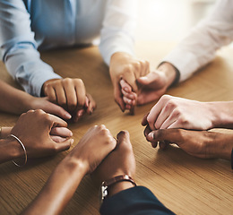 Image showing Trust circle, therapy and people holding hands by a wood table at a group counseling or psychology session. Gratitude, spiritual and friends praying together for religion, community and connection.