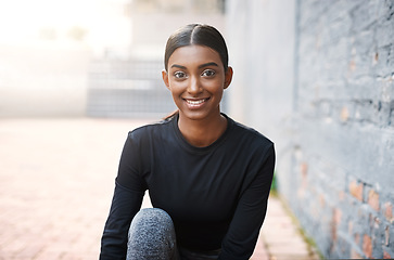 Image showing Fitness, smile and portrait of young Indian woman ready for training or routine or motivation and wellness outdoors. Exercise, happy marathon and face of female runner or workout health and mock up