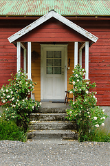 Image showing old entrance with flowers