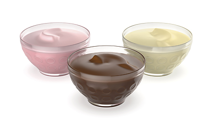 Image showing Chocolate, vanilla and strawberry puddings