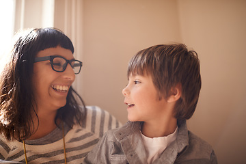 Image showing Family, mother and son with love, talking and bonding with happiness, relax and communication. Female parent, mama and boy with joy, male child and kid with his mom, conversation and chatting at home